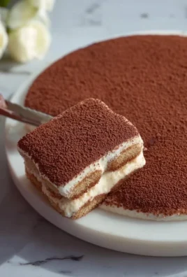 Authentic Italian tiramisu dessert with coffee, cocoa, and mascarpone layers