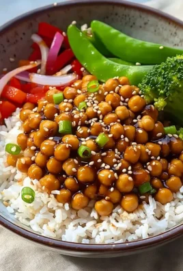 Delicious plate of Tso's Chickpeas garnished with green onions.