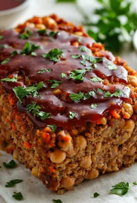 Healthy chickpea meatloaf served with vegetables on a plate