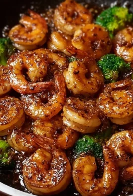 Delicious high-protein honey garlic shrimp served with fresh vegetables