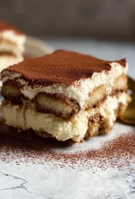 Delicious homemade authentic Italian Tiramisu dessert with coffee and mascarpone