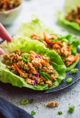 Delicious Low Carb Thai Chicken Lettuce Wraps served on a plate