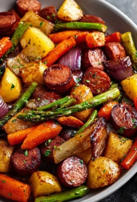 One-Pan Honey Garlic Kielbasa with colorful veggies served in a skillet