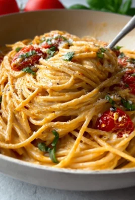 Delicious roasted tomato garlic ricotta pasta served in a bowl.