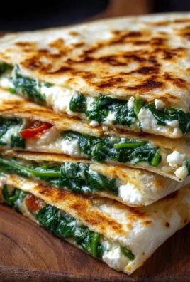 Delicious spinach and feta quesadillas served on a plate