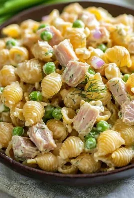 Delicious Tuna Pasta Salad with fresh ingredients and dressing.