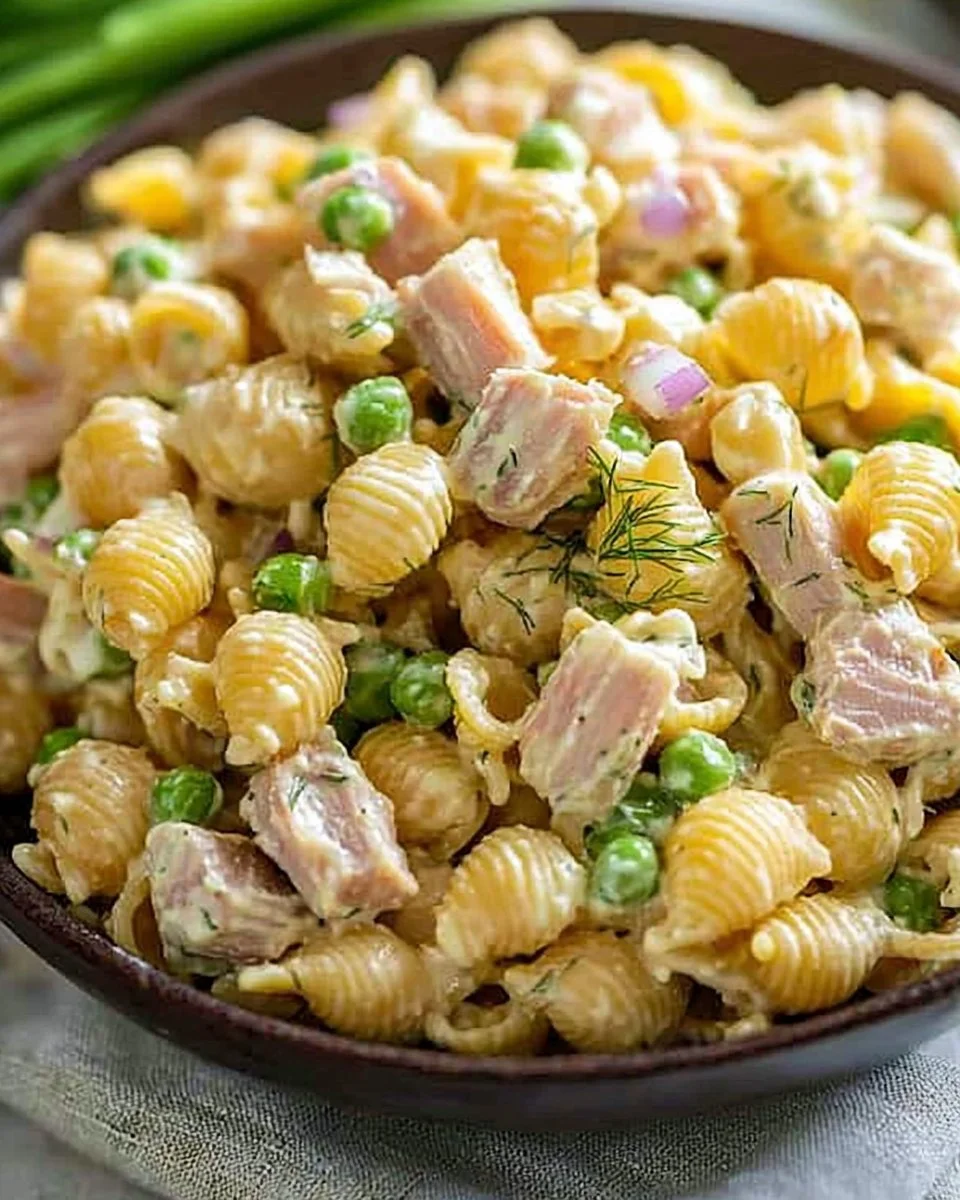 Delicious Tuna Pasta Salad with fresh ingredients and dressing.