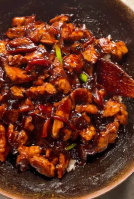 Delicious Bourbon Chicken served with rice and vegetables