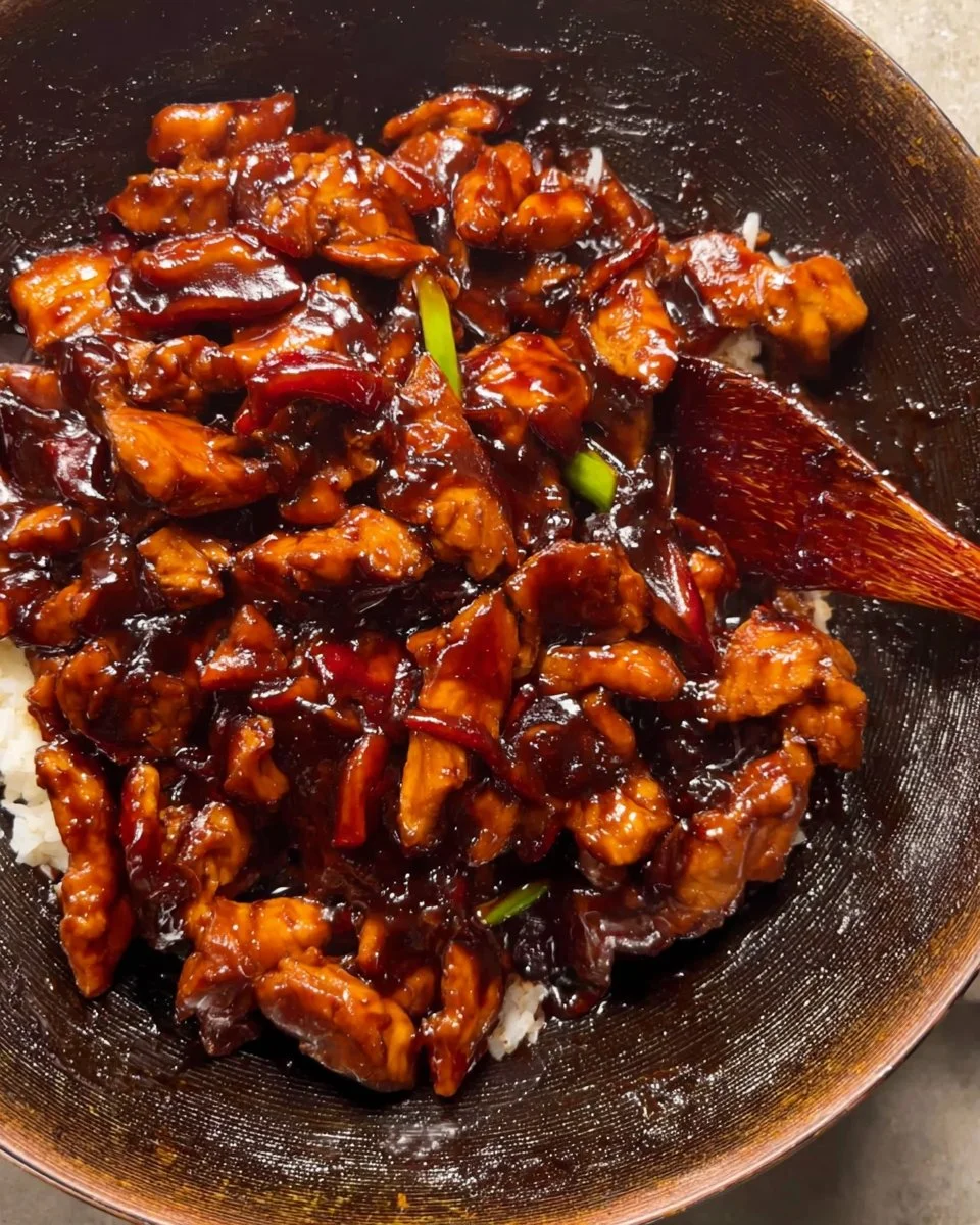 Delicious Bourbon Chicken served with rice and vegetables