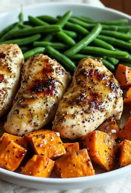 Delicious honey garlic chicken served with sweet potatoes, ideal for a quick dinner.
