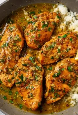 Delicious Garlic Butter Chicken served with herbs and spices