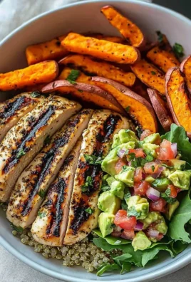 Grilled Herb Chicken Bowl served with sweet potato fries and avocado salsa