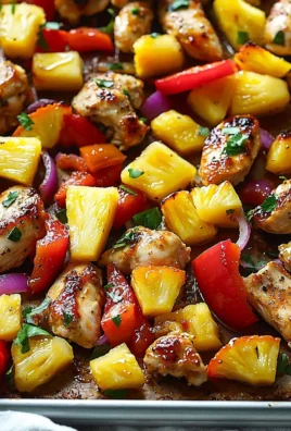 Hawaiian Chicken Sheet Pan with vibrant veggies and pineapple