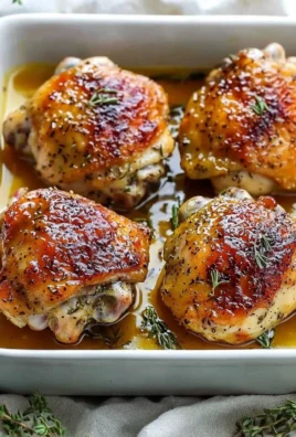 Delicious herbed honey mustard chicken garnished with fresh herbs