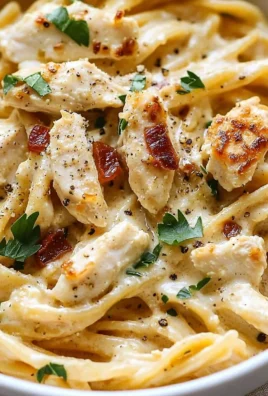 A delicious plate of Marry Me Chicken Pasta topped with herbs and cream sauce.