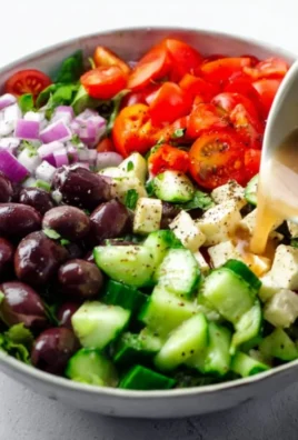A vibrant Mediterranean Chopped Salad filled with fresh vegetables and feta cheese.