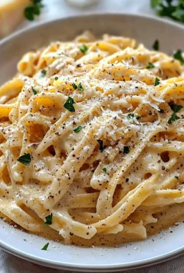 Delicious bowl of one pot creamy garlic pasta with fresh herbs.