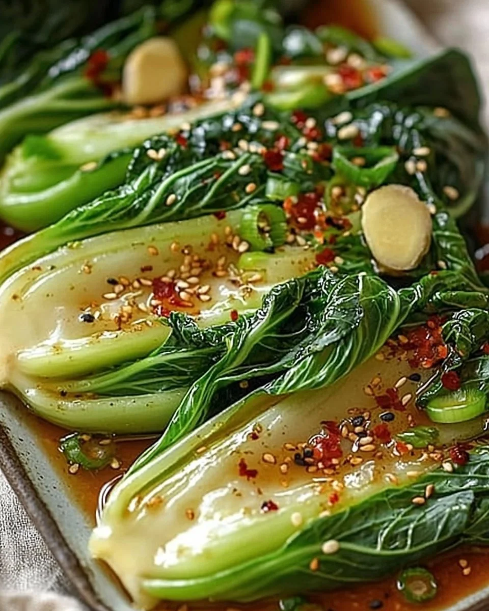 Quick Bok Choy cooked with ginger chili sauce served in a bowl