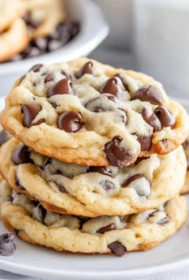 Freshly baked award-winning chocolate chip cookies on a cooling rack