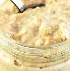 Bowl of basic overnight oats topped with fresh fruits and nuts