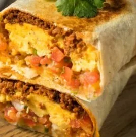 Delicious homemade breakfast burritos filled with eggs, cheese, and vegetables
