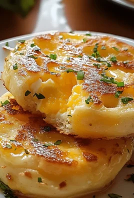 Delicious breakfast eggy crumpets topped with herbs and spices.