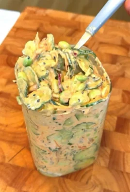 Creamy Asian Cucumber Salad with vibrant ingredients and a creamy dressing