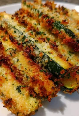 Crispy Air Fryer Parmesan Zucchini Fries on a plate