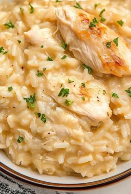Delicious Instant Pot chicken and rice served in a bowl with herbs.