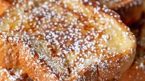 Air fryer French toast with golden crispy exterior and fluffy interior.