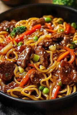 Easy 30-minute beef stir fry with noodles in a colorful bowl