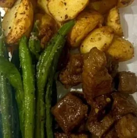 Delicious garlic balsamic steak bites served as a gourmet appetizer.