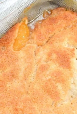 Delicious homemade Georgia Peach Cobbler with fresh juicy peaches and crust.