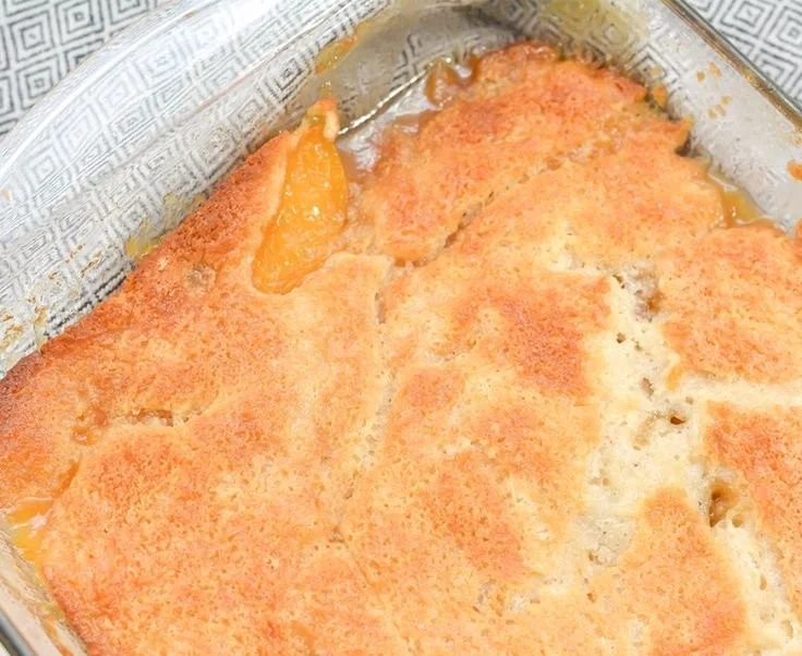 Delicious homemade Georgia Peach Cobbler with fresh juicy peaches and crust.