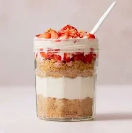 Delicious high protein cheesecake jars recipe with layers of creamy goodness