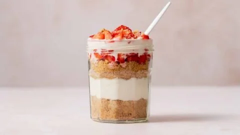 Delicious high protein cheesecake jars recipe with layers of creamy goodness