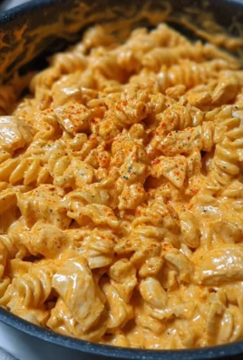 One-Pot Creamy Spicy Buffalo Chicken Pasta dish with vibrant colors