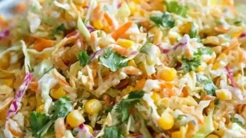 Delicious Spicy Corn Slaw served in a bowl with fresh ingredients