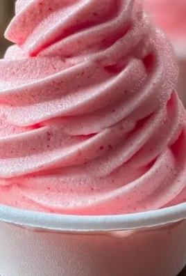 Delicious Strawberry Dole Whip in a bowl, perfect for a refreshing dessert.