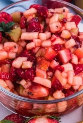 Sweet fruit salad with colorful fruits and cinnamon sugar tortilla chips