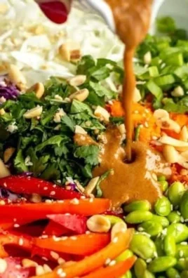Thai Peanut Chicken Crunch Salad with fresh vegetables and vibrant dressing