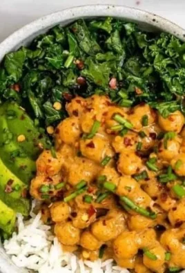 Vibrant Vegan Buddha Bowl filled with fresh veggies, grains, and plant-based proteins.