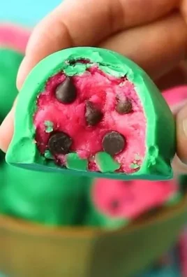 Delicious Watermelon Truffles decorated with vibrant designs.